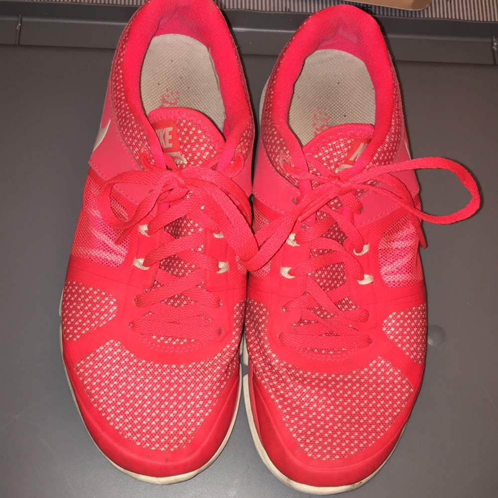 Pink Nike tennis shoes